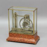 NOVELTY WATERWHEEL CLOCK, the 6 1/4" clear dial on a brass, ball bearing driven mechanism, the