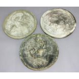 SET OF THREE RECONSTITUTED STONE CIRCULAR WALL PLAQUES, cast with cherubs, diameter 49cm (2)
