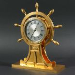 GILT BRASS SHIP'S WHEEL MANTEL TIMEPIECE, the 4 1/2" silvered dial with engine turned centre and