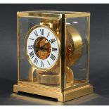 JAEGER LE COULTRE ATMOS CLOCK, serial number 561040, with an enamelled chapter ring, in a gilt brass