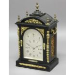 VICTORIAN MANTEL CLOCK, the silvered, arched dial with black gothic Roman numerals beneath