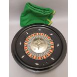 Roulette Wheel & Green Cloth