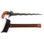 A KRIS . An attractive Kris with a 14" wavy-edged blade and carved wooden Garuda Bird hilt. Bi-