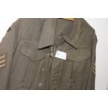 A W W 11 SERGEANTS BATTLEDRESS BLOUSE. Dated inside on the label 1941, with various sleeve devices