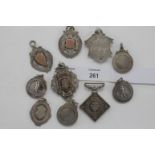 AN ARMY TEMPERANCE MEDAL etc An India reverse Army Temperance Medal in silver, unusual pendant shape