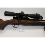 A PNUEMATIC RWS .177 AIR RIFLE WITH MODERATOR. Complete with Telescopic Sight and sling, also a