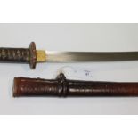 A SHIN GUNTO KATANA. A Shin Gunto Katana with 25.3/4" blade, with an oil quenched temper line,