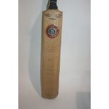 SIGNED CRICKET BAT - CELEBRITIES a cricket bat signed by cricketers and celebrities, including Jim