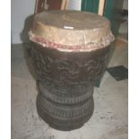 TRIBAL DRUM a large carved wooden drum, possibly Indian. Heavily carved with decorative bands. 64cms