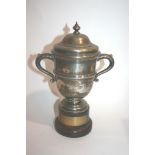 SILVER TROPHY CUP - HORSE RACING INTEREST a lidded silver cup (not inscribed), weighing 21ozs and