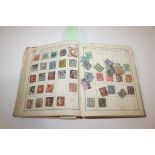 STAMP ALBUM a Lincoln Album of World Stamps, including Great Britain with cut into 1d Black (loose),