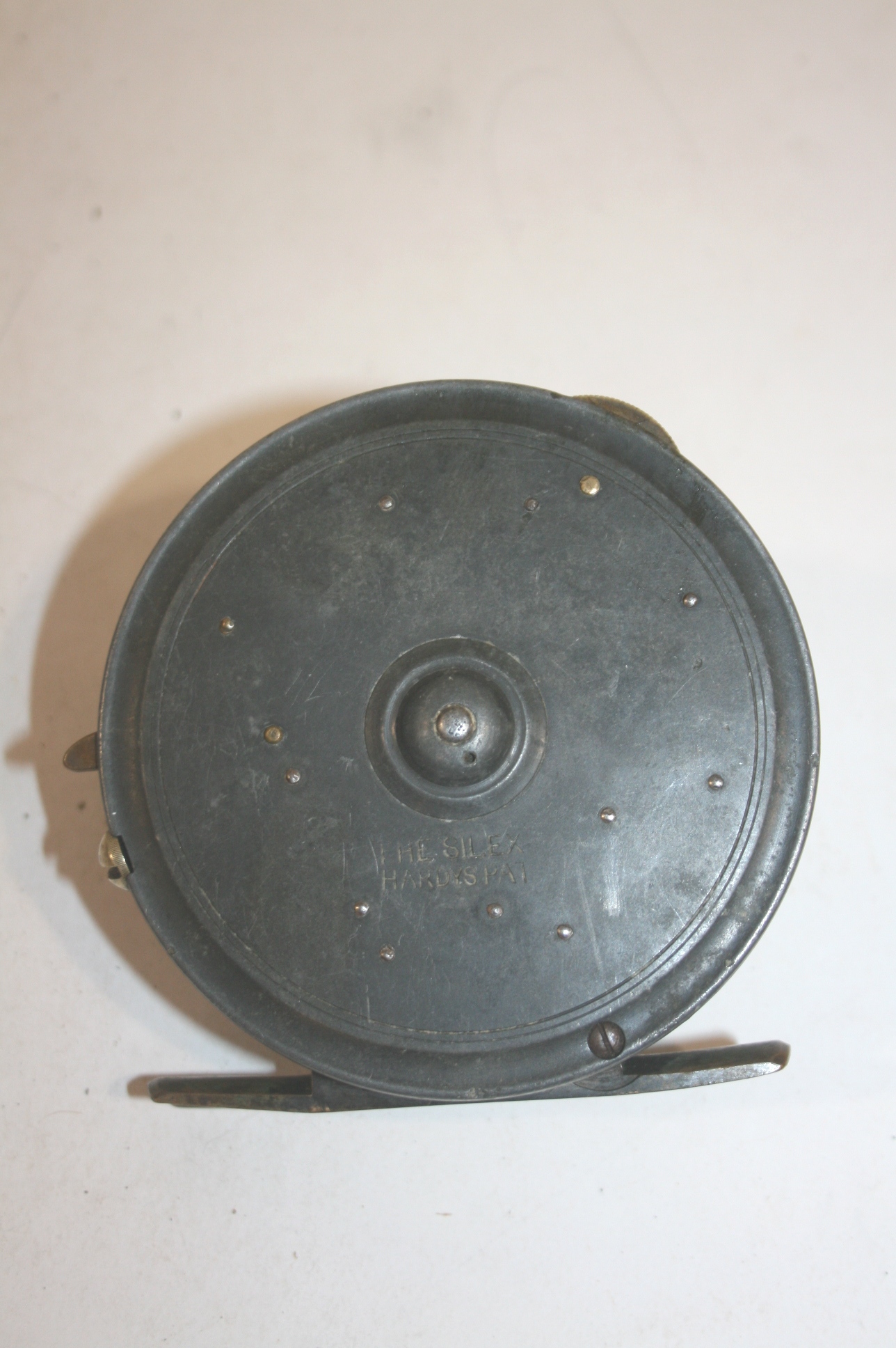 HARDY FISHING REEL an early Hardy The Silex patent reel, a 4" reel with a brass foot and twin