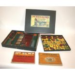 MECCANO NO 4 a boxed construction set No 4, with 2 layers of items including 4 original Meccano tins