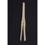 GLOVE STRETCHERS A pair of bone glove stretchers with a monogram on the side. 8" (1)