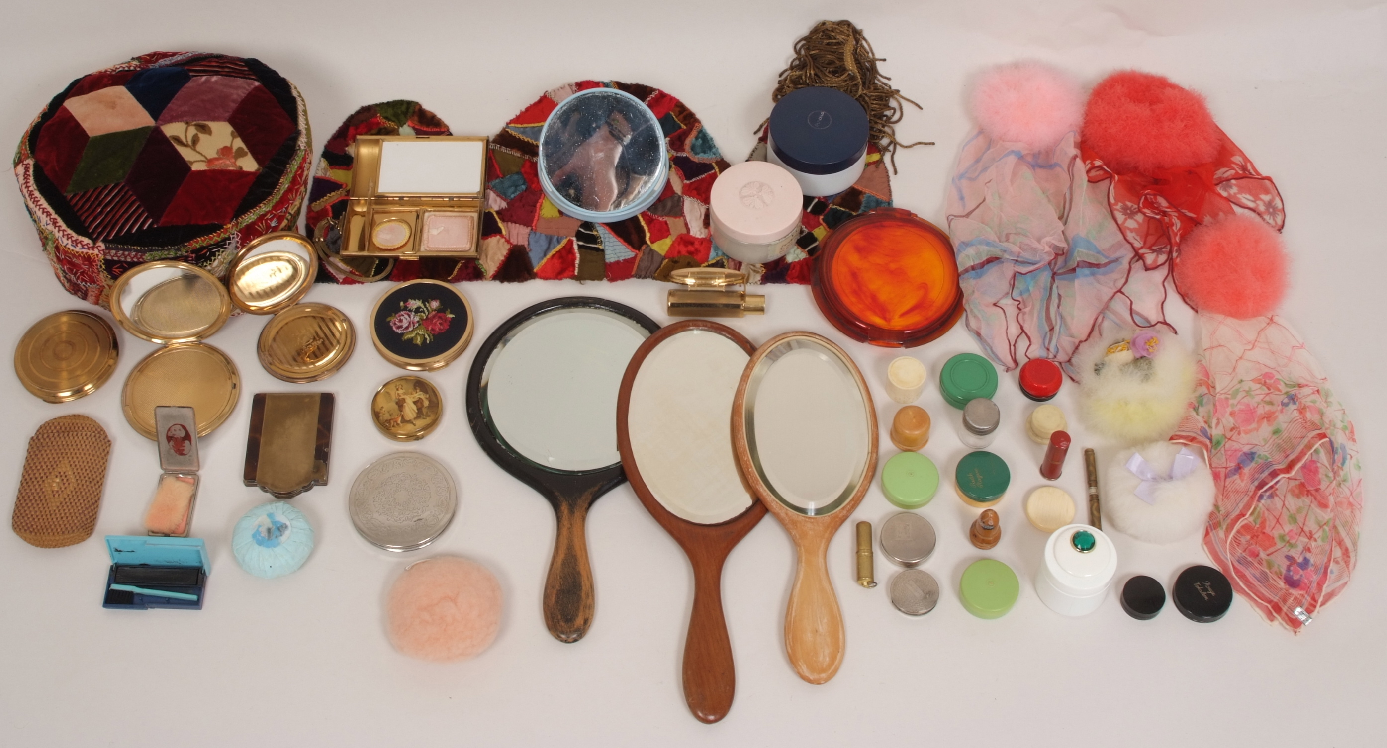 A MIXED LOT OF COMPACTS AND DRESSING TABLE ITEMS To include compacts, mirrors make-up containers,