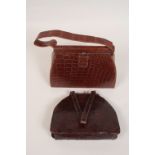 TWO VINTAGE CROCODILE HANDBAGS A 1950's lighter brown crocodile handbag with inner zipped pocket.