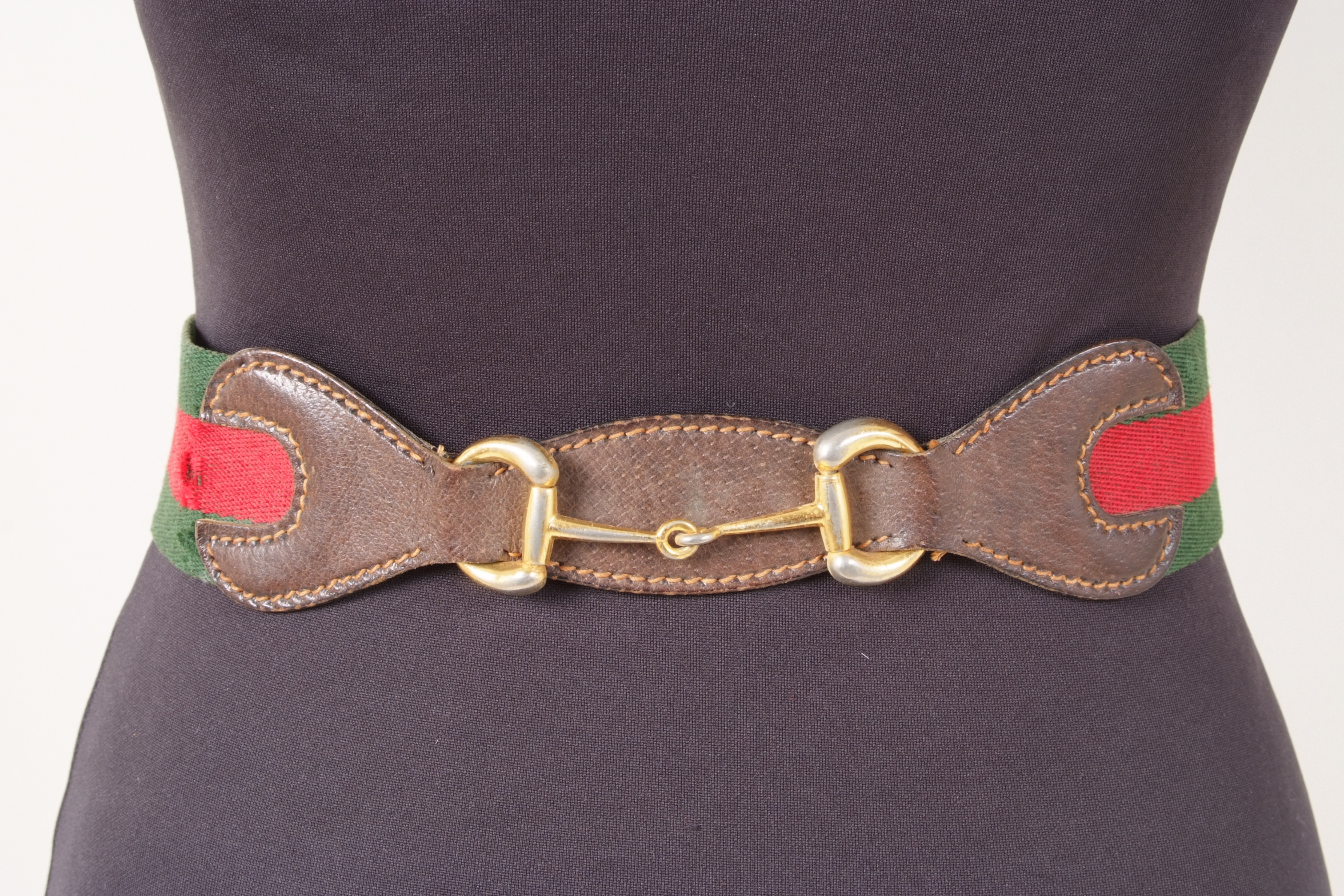 A 'GUCCI' BELT Green and red fabric with horse bit on leather in centre. Horse shoe gold buckle. - Image 2 of 2