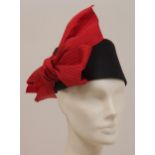 A 1980'S 'JOHN BOYD' SILK FLOWER POT HAT WITH RIBBON Black grosgrain silk with red silk ribbon.