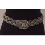 A 1980'S SILVER CHAIN BELT Fabulous heavy silver metal chain belt. 29" Length. (1)