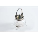 A SMALL EDWARDIAN MOUNTED GLASS MUSTARD POT in the form of a cauldron, by Levi & Salaman, Birmingham
