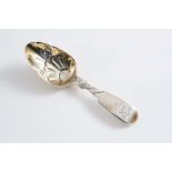 A GEORGE III FIDDLE PATTERN CADDY SPOON with chased decoration, crested, by Peter & William Bateman,