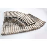 BY PAUL STORR:- A scarce set of twenty four George III table knives and twenty four table forks,