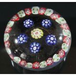 MILLEFIORI PAPERWEIGHT, probably St Louis, a central yellow cane surrounded by five red, white and