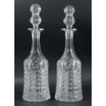 PAIR OF VICTORIAN MAGNUM WINE DECANTERS AND STOPPERS, of mallet form, the faceted neck above cut
