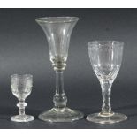 WINE GLASS, mid 18th century, the bell shaped bowl with two basal knops above a plain stem with ball