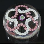 CLICHY GARLAND PAPERWEIGHT, a central purple cane inside intertwined white and pink garlands,