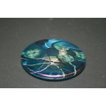 DITCHFIELD GLASS PAPERWEIGHT a circular iridescent glass paperweight, designed with Flowers and with