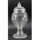 GEORGE III LEECH JAR AND COVER, of inverted baluster form, with acorn finial and folded foot rim,