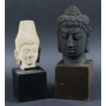 Two Indonesian Volcanic Buddha Heads