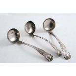 A SET OF THREE SCOTTISH TODDY LADLES King's pattern (single struck with shoulders), monogrammed,