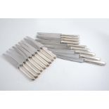 A SET OF NINE LATE 20TH CENTURY, OLD ENGLISH THREAD PATTERN TABLE KNIVES & nine side knives to