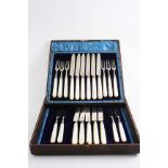 A VICTORIAN CASED SET OF ELEVEN DESSERT/FRUIT KNIVES & TEN FORKS with mother of pearl handles by