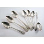 SEVEN VARIOUS TABLE SPOONS:- A pair of large Irish spoons initialled "JA", by J. Brady, Dublin 1799,