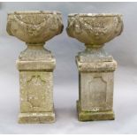 PAIR OF RECONSTITUTE STONE URNS AND PEDESTALS, with swag decoration, height 80cm (4)