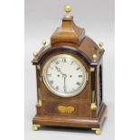 REGENCY STYLE MAHOGANY BRACKET CLOCK, the silvered 6" dial on a brass, eight day, twin chain
