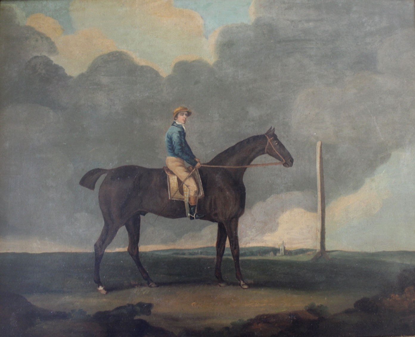 MANNER OF GEORGE STUBBS, ARA (1724-1806) HORSE AND JOCKEY ON A HEATH Oil on canvas 44.5 x 55cm. ++