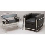 TWO DESIGNER CONTEMPORARY ARMCHAIRS including a leather and chrome armchair in the manner of a LC2