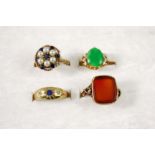 AN 18CT. GOLD AND GEM SET GYPSY RING set with a circular sapphire and two small diamonds, size P,