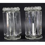 PAIR OF GLASS LUSTRES, late 19th century, with faceted hollow bodies above foliate feet, height 23cm
