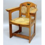 WILLIAM BIRCH ARTS & CRAFTS ARMCHAIR - E G PUNNETT an Arts & Crafts oak chair, designed by E G