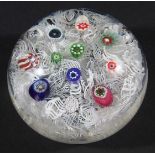 PERTHSHIRE PAPERWEIGHT, with date canes P1969, with ten millefiori canes on a scattered latticino