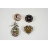 A CITRINE AND PEARL SET BROOCH the heart-shaped brooch is centred with a citrine mounted with a