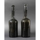 PAIR OF OLIVE GLASS WINE BOTTLES, late 18th century, with long necks and slightly tapering