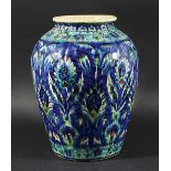 PERSIAN VASE, of ovoid form, decorated in the Isnik palette with stylised flowers and foliage on a