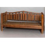 SIDNEY BARNSLEY (1865-1926) - ARTS & CRAFTS SETTEE a large oak settee, the back with vertical