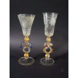 TWO MURANO GLASSES the two hand blown glasses with elaborate twisted stems and gilded decoration,